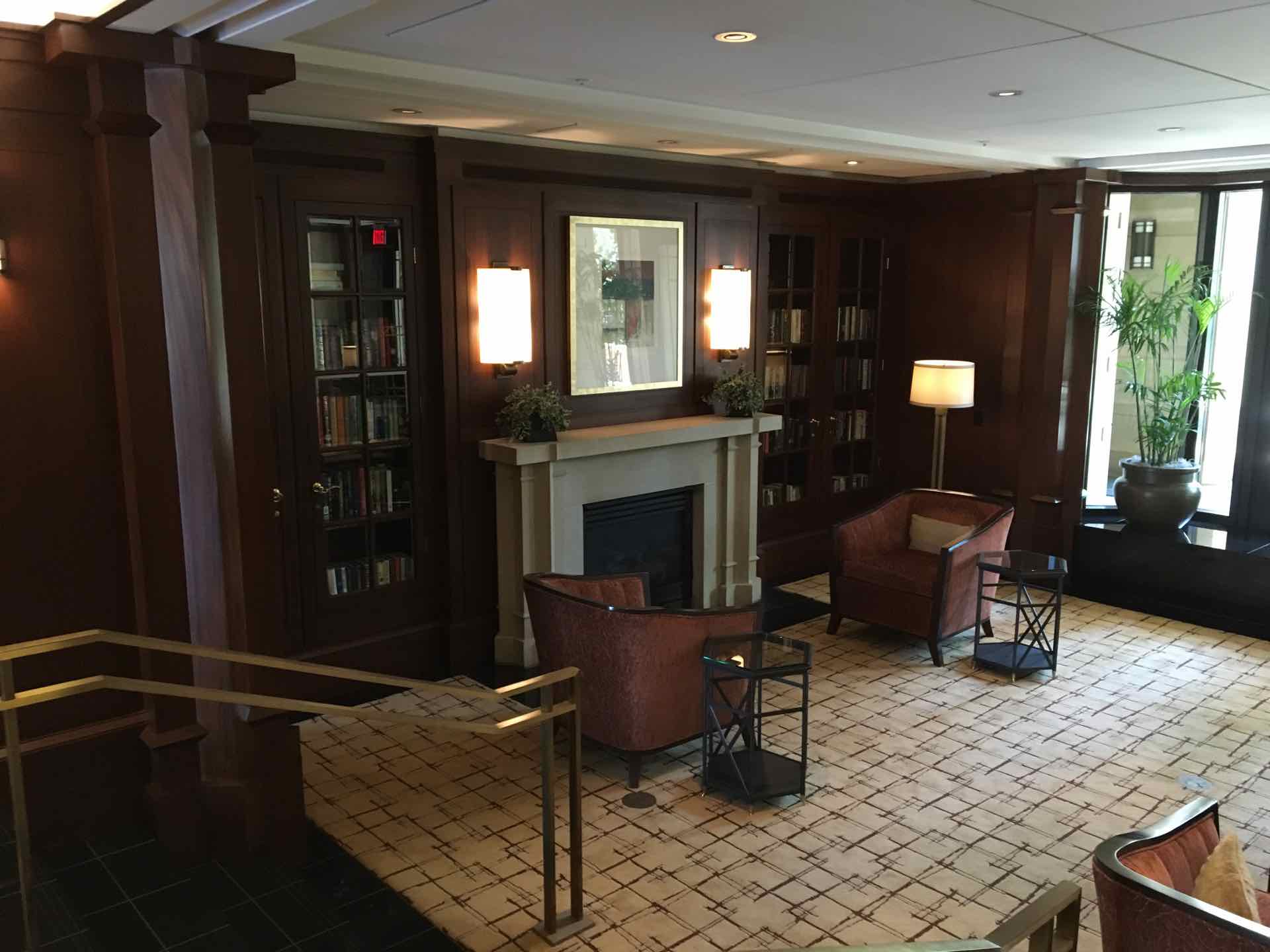 lobby seating area next to a fireplace
