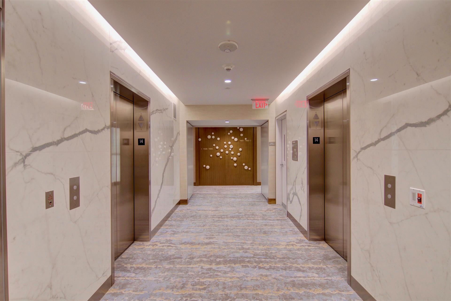 Elevator hallway leading to condominium residences