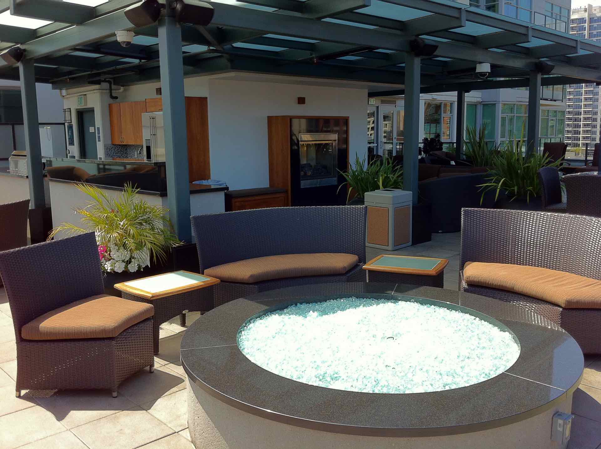 Fire pit area in community lounge of downtown San Diego The Legend condo tower