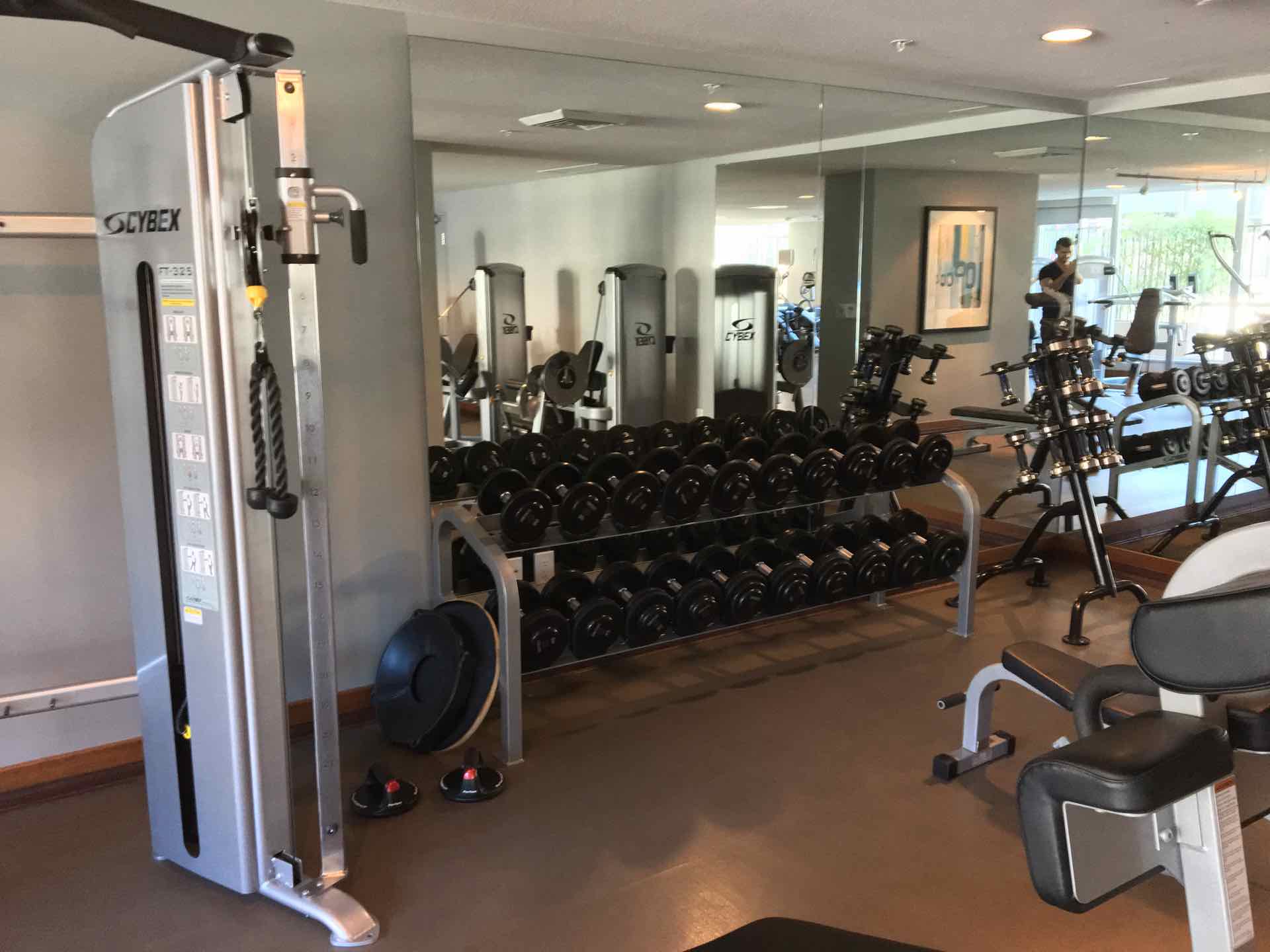 Free weights inside gym of downtown San Diego high rise condo tower